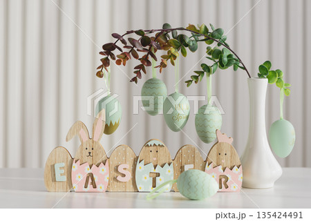 Wooden Easter Letter Eggs with Bunny and Chick Figures. Festive Spring Decor 135424491