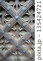 Ornate wooden door lattice pattern 135424721