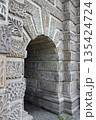 Carved stone arch detail in historic architecture 135424724