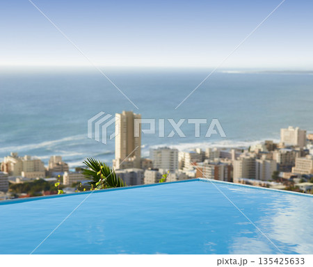 Travel, vacation and pool in city with ocean and hotel view in Cape Town with nobody, buildings and urban beach property. Cityscape, sea and blue sky at luxury accommodation for summer holiday trip. 135425633