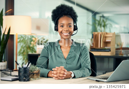 Black woman, portrait and smile in call center for business, customer service or telemarketing in office. Contact us, face and African female sales agent, support consultant or professional at night. Black woman, portrait and smile in call center for business, customer service or telemarketing in office. Contact us, face and African female sales agent, support consultant or professional at night. 135425971