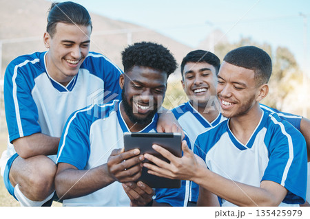 Sports group, team and tablet outdoor on soccer field for fitness training or online planning. Football, club and diversity athlete people or friends with tech to watch competition, game or video 135425979