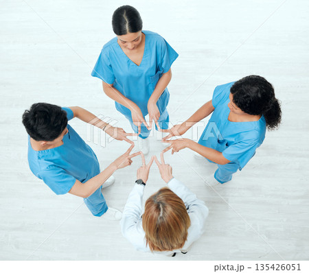 Above, star or hands of doctors in hospital with teamwork in nurses collaboration for healthcare goal. About us, team building or top view of medical group with support shape, motivation or mission 135426051