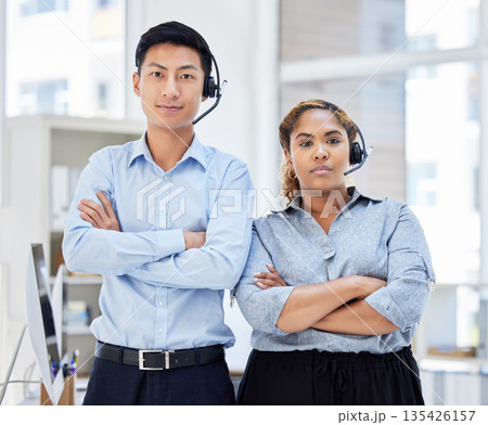 Call center, portrait and team together in office with headset for telemarketing sales. Diversity workplace with serious man and woman agent focus on customer service, contact us or crm support Call center, portrait and team together in office with headset for telemarketing sales. Diversity workplace with serious man and woman agent focus on customer service, contact us or crm support 135426157