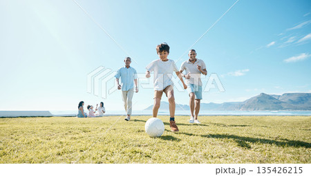 Family, soccer and men with ball in a park for fun, playing and bonding in nature on blue sky background. Sports, games and boy child with father and grandfather outdoors for weekend football match Family, soccer and men with ball in a park for fun, playing and bonding in nature on blue sky background. Sports, games and boy child with father and grandfather outdoors for weekend football match 135426215