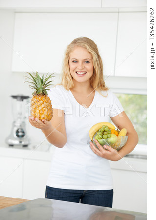 Fruits, pineapple or portrait of happy woman with healthy lunch or breakfast meal or diet in kitchen at home. Morning, smile or vegan girl with natural food to lose weight for gut health or wellness Fruits, pineapple or portrait of happy woman with healthy lunch or breakfast meal or diet in kitchen at home. Morning, smile or vegan girl with natural food to lose weight for gut health or wellness 135426262