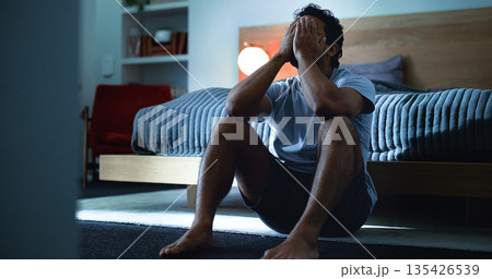 Insomnia, thinking and man in bedroom at night for burnout, exhausted and fatigue for mental health. Tired, dark and person with upset, sad and anxiety for sleepless, bad dream and frustrated in home Insomnia, thinking and man in bedroom at night for burnout, exhausted and fatigue for mental health. Tired, dark and person with upset, sad and anxiety for sleepless, bad dream and frustrated in home 135426539