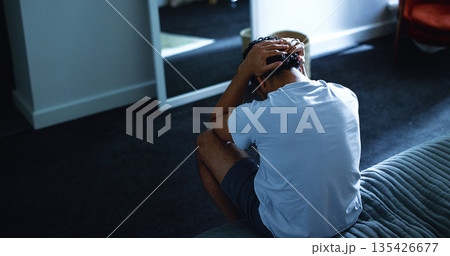 Insomnia, night and above of man in bedroom with stress for burnout, exhausted and fatigue for mental health. Home, dark and person with upset, sad and frustrated for sleepless, bad dream and tired Insomnia, night and above of man in bedroom with stress for burnout, exhausted and fatigue for mental health. Home, dark and person with upset, sad and frustrated for sleepless, bad dream and tired 135426677