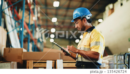 Man, tablet and warehouse inspection for storage, checklist or boxes with inventory management. Person, tech and profile with application, logistics or bokeh with supply chain at distribution plant Man, tablet and warehouse inspection for storage, checklist or boxes with inventory management. Person, tech and profile with application, logistics or bokeh with supply chain at distribution plant 135426724