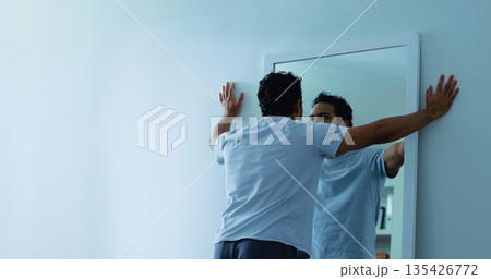 Mental health, reflection or man in mirror with thoughts, psychosis or paranoid with personality disorder. Schizophrenia, space or person in house with bipolar, trauma or anxiety in emotional crisis. 135426772