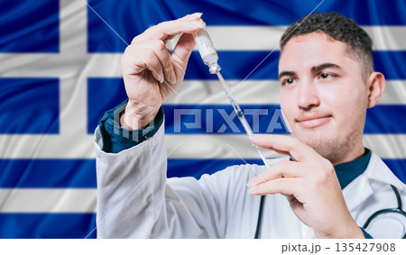 Doctor holding syringe on Greece flag background. Medical professional holding syringe with Greek flag in the background Doctor holding syringe on Greece flag background. Medical professional holding syringe with Greek flag in the background 135427908