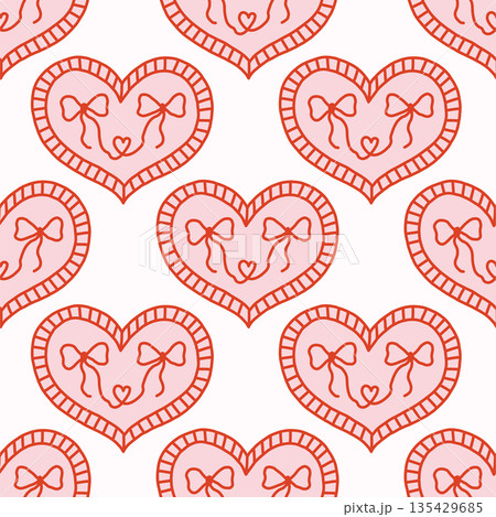 Vector seamless pattern with decorative hearts in a whimsical doodle style. Romantic pink and red design inspired by folk art, perfect for Valentines Day, wrapping paper, textiles, and branding 135429685