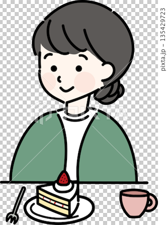 Woman sitting in front of cake 135429723