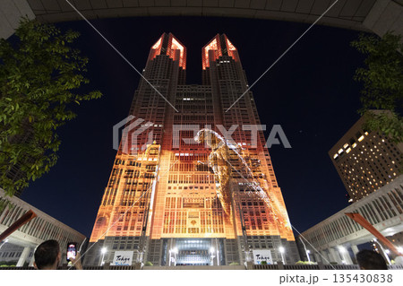 a light show of godzilla on the wall of Tokyo Metropolitan Government building in Shinjuku a light show of godzilla on the wall of Tokyo Metropolitan Government building in Shinjuku 135430838