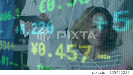 Sitting patient consulting with staff in clinic, stethoscopes and financial overlay, copy space 135433225
