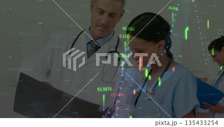 Doctor in lab coat and nurse in scrubs reviewing scan film in clinic with digital overlays Doctor in lab coat and nurse in scrubs reviewing scan film in clinic with digital overlays 135433254