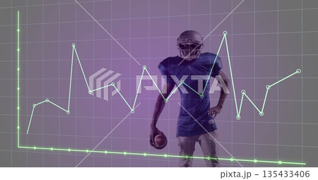 Standing football player holding football, wearing helmet and pads in studio, with graph overlay Standing football player holding football, wearing helmet and pads in studio, with graph overlay 135433406