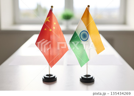 China and India miniature desk flags on conference table for diplomatic talks 135434269
