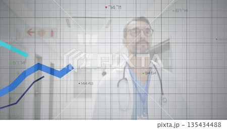 Walking male doctor wearing lab coat with stethoscope through hospital corridor, with data overlays 135434488