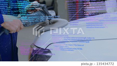 Polishing auto detailer buffing car fender in workshop, with electric buffer and code overlay Polishing auto detailer buffing car fender in workshop, with electric buffer and code overlay 135434772