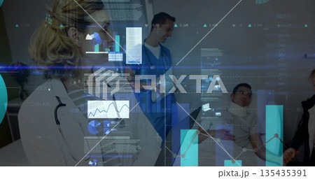 Consulting doctor examining patient in hospital exam room, with holographic data, copy space Consulting doctor examining patient in hospital exam room, with holographic data, copy space 135435391