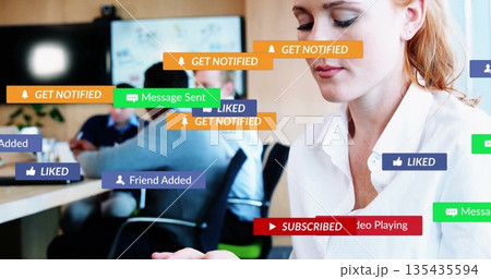 Holding smartphone white woman wearing blouse scanning notification icons at office, copy space Holding smartphone white woman wearing blouse scanning notification icons at office, copy space 135435594