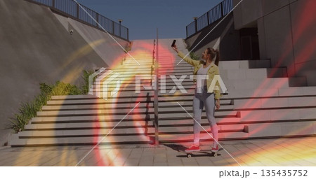 Snapping selfie skateboarder standing on board at plaza stairs with phone and planters, copy space 135435752