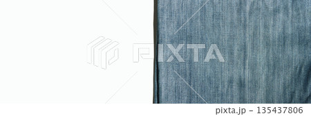 Close-up of blue denim jeans texture with detailed fabric weave for fashion 135437806