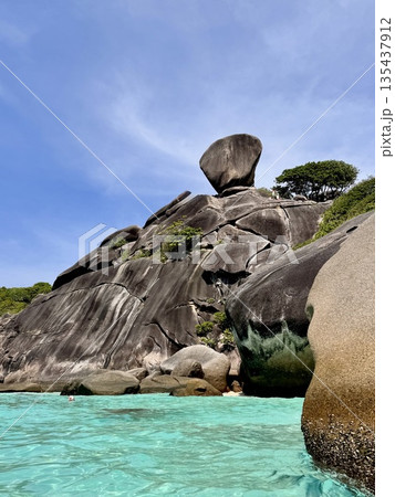Thailand's Similan Islands, known for their snow-white beaches, crystal clear waters, coral reefs, and rich underwater world Thailand's Similan Islands, known for their snow-white beaches, crystal clear waters, coral reefs, and rich underwater world 135437912