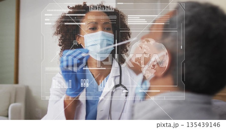 Administering female medic swabbing patient nostril in clinic with nasal swab surgical mask overlay 135439146