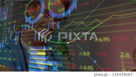 Smiling doctor wearing blue scrubs with stethoscope posing in corridor, overlaying stock charts Smiling doctor wearing blue scrubs with stethoscope posing in corridor, overlaying stock charts 135439167