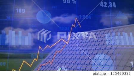 Tilted solar panel with hexagonal cells displaying yellow line graph and bar charts in grassy field Tilted solar panel with hexagonal cells displaying yellow line graph and bar charts in grassy field 135439355