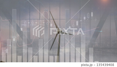 Displaying wind turbine showing financial overlays at foggy wind farm, bar candlestick line graphs 135439408