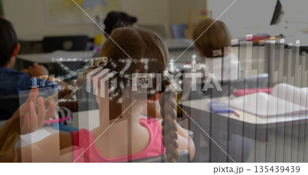 Touching braided pigtails student viewing bar chart overlay in classroom, with worksheets Touching braided pigtails student viewing bar chart overlay in classroom, with worksheets 135439439