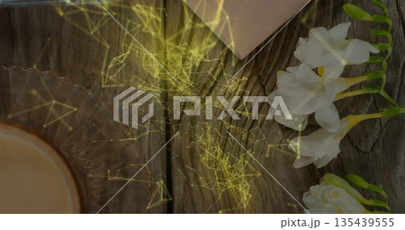 Sitting coffee cup holding crema on wooden tabletop, with book freesia digital overlay, copy space Sitting coffee cup holding crema on wooden tabletop, with book freesia digital overlay, copy space 135439555