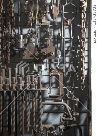 Stand with metal tools and devices 135439735