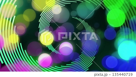 Swirling concentric arc spirals intersecting against dark base with multicolor blurred orbs 135440719