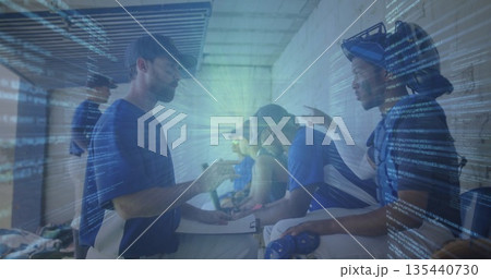 Navy cap coach holding clipboard addressing players in dugout, with bats, code overlay, copy space 135440730