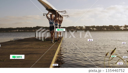 Four rowers carrying shell overhead on wooden dock at golden hour, with digital icons, copy space 135440752