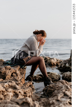 Woman Grief Ocean; Seashore Solitude: Emotional Distress Shown, Coastal Setting, Present Day. Woman Grief Ocean; Seashore Solitude: Emotional Distress Shown, Coastal Setting, Present Day. 135441553