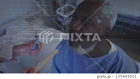 Examining doctor holding otoscope near patient in light blue gown in clinic, with code overlay 135443011