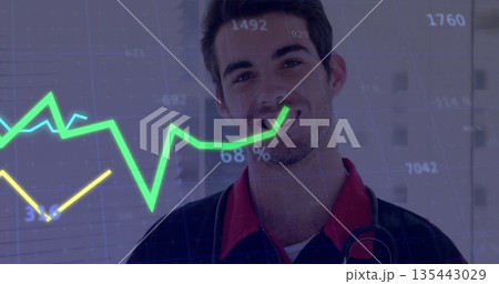 Standing male doctor wearing navy jacket in corridor with stethoscope and grid-chart overlay 135443029