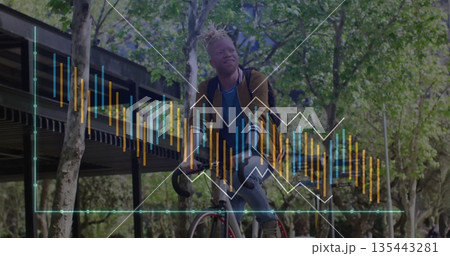 Cycling man with backpack riding bicycle along path by steel walkway, with floating data graphic Cycling man with backpack riding bicycle along path by steel walkway, with floating data graphic 135443281