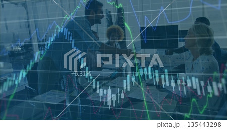 Shaking hands two professionals wearing suits in glass-walled conference room, with laptops, charts Shaking hands two professionals wearing suits in glass-walled conference room, with laptops, charts 135443298