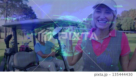 Woman holding golf club upright on golf course cart path, with golf cart and holographic overlay 135444430