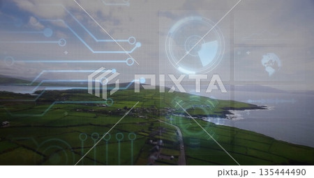Displaying HUD graphics over green agricultural peninsula road with stone walls, rocky shoreline 135444490