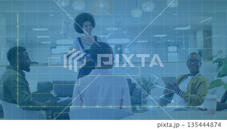 Presenting woman in overalls discussing project in office lounge with tablet laptop and HUD overlay Presenting woman in overalls discussing project in office lounge with tablet laptop and HUD overlay 135444874