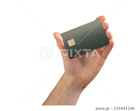 Bank card in hand client close up. Plastic chip for payment, purchase and shopping commerce. Finance Bank card in hand client close up. Plastic chip for payment, purchase and shopping commerce. Finance 135445106