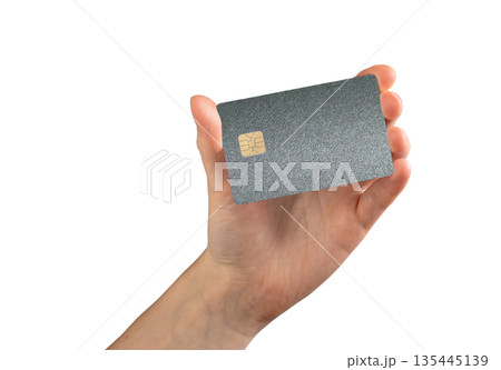 Bank card in hand plastic close up. Chip payment for shopping, purchase and commerce trade. Finance 135445139