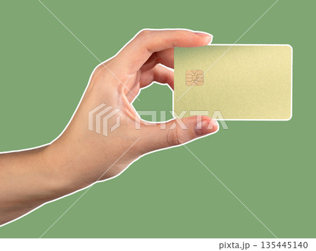 Bank card in hand rich close up. Colored plastic chip for payment, purchase and shopping trade. Bank card in hand rich close up. Colored plastic chip for payment, purchase and shopping trade. 135445140